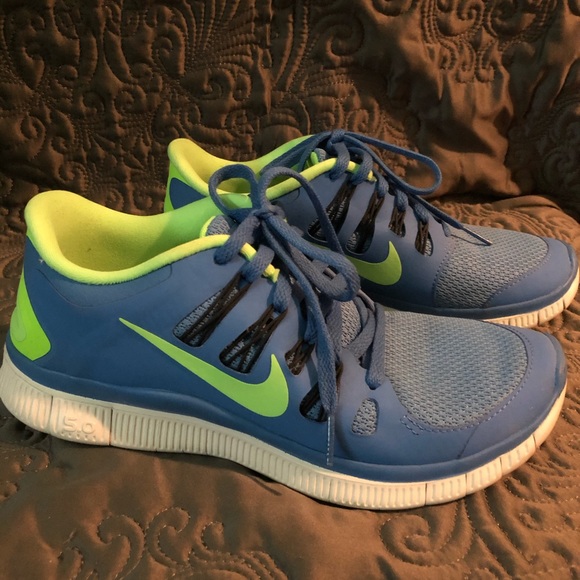 Nike Shoes - NIKE FREE 5.0 Running Shoes.